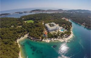 an aerial view of a resort on a island in the water at 1 Bedroom Amazing Apartment In Mali Losinj in Mali Lošinj