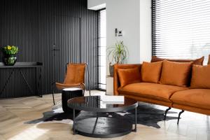 אזור ישיבה ב-Komfortowe OH Apartamenty Zator