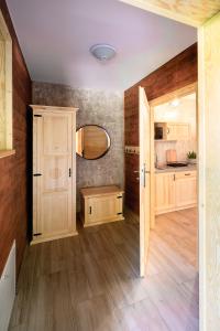 Η κουζίνα ή μικρή κουζίνα στο Apartamenty przy Młynie