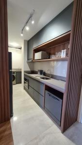 Кухня или мини-кухня в Conforto e sofisticação à 500m da Vila Germânica
