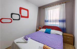 Ein Bett oder Betten in einem Zimmer der Unterkunft 2 Bedroom Stunning Apartment In Pula