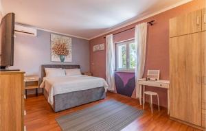 Posteľ alebo postele v izbe v ubytovaní Cozy Home In Medulin With Kitchen