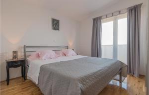 Posteľ alebo postele v izbe v ubytovaní Three-Bedroom Holiday Home In Grubine