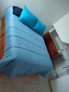 En eller flere senge i et værelse på Casa Cielo + 5 billeder