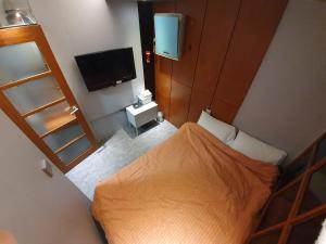 Ένα ή περισσότερα κρεβάτια σε δωμάτιο στο Dalgona Guesthouse