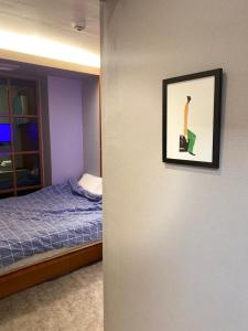 Ένα ή περισσότερα κρεβάτια σε δωμάτιο στο Dalgona Guesthouse