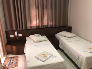 Кровать или кровати в номере Hotel Cruz de Aviz