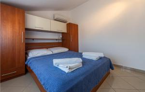 Posteľ alebo postele v izbe v ubytovaní Amazing Apartment In Seline With Wifi