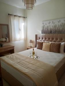 Postel nebo postele na pokoji v ubytování DIMITRIS APARTMENT