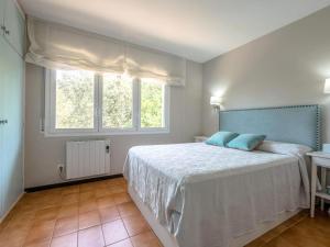 Postel nebo postele na pokoji v ubytování Sol naixent ii