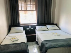 Кровать или кровати в номере Hotel Cruz de Aviz