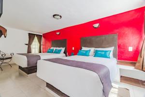 Cama o camas de una habitación en Ayenda Mesón del Río