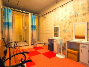 A bathroom at Guesthouse Churayado Ishigakijima