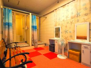 Televisyen dan/atau pusat hiburan di Guesthouse Churayado Ishigakijima