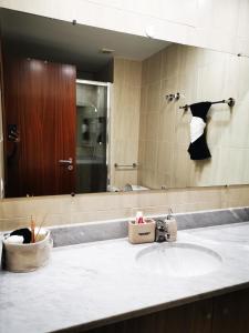 Et badeværelse på Apartamento com Vista para a Baía de Luanda