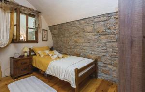 Postel nebo postele na pokoji v ubytování Two-Bedroom Holiday Home In Benkovac