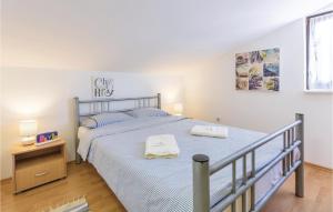 Postel nebo postele na pokoji v ubytování Apartment Medulin Katikulic Iv + 19 fotografií