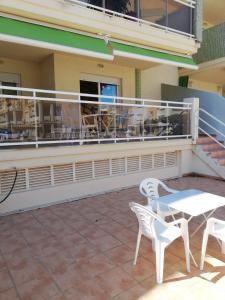 A balcony or terrace at Delfines III Solo Familias Serviplaya