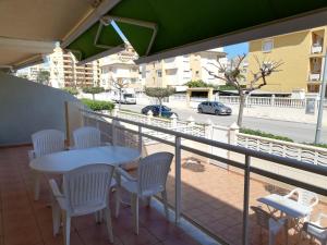 A balcony or terrace at Delfines III Solo Familias Serviplaya