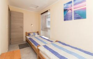 Posteľ alebo postele v izbe v ubytovaní Two-Bedroom Holiday Home In Zadar