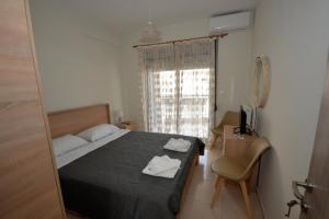 Postel nebo postele na pokoji v ubytování APOSTOLIAS APARTMENTS