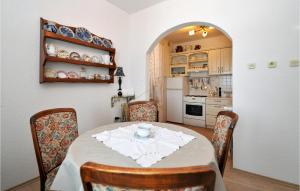 Kuchyň nebo kuchyňský kout v ubytování Apartment Stara Riva L-531