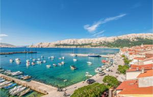 a view of a harbor with boats in the water at 2 Bedroom Gorgeous Home In Baska in Baška