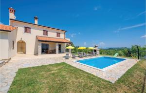 The swimming pool at or near Four-Bedroom Holiday Home in Bregi