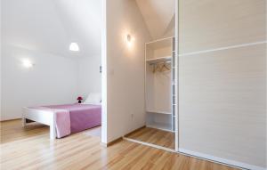 Postel nebo postele na pokoji v ubytování Four-Bedroom Holiday Home In Blato Na Cetini