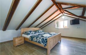 Postel nebo postele na pokoji v ubytování Holiday Home Pucisca 15