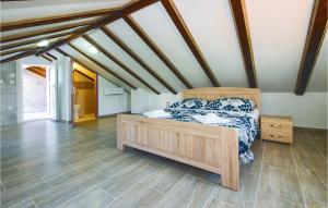 Postel nebo postele na pokoji v ubytování Holiday Home Pucisca 15