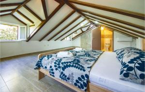 Postel nebo postele na pokoji v ubytování Holiday Home Pucisca 15