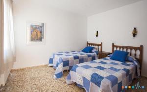 Postel nebo postele na pokoji v ubytování VH CostaBlanca - RULLE + 37 fotografií