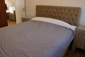A bed or beds in a room at Murtovina Podgorica