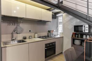 Virtuvė arba virtuvėlė apgyvendinimo įstaigoje Luxury Home Vittoria