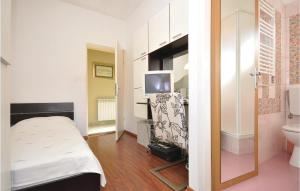Postel nebo postele na pokoji v ubytování Apartment Supetar Ive Vojnovica