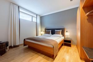 Posteľ alebo postele v izbe v ubytovaní Schneeglöckle Appartements
