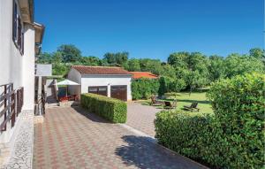 Zahrada ubytování Holiday Home Hrboki V