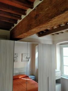 Ένα ή περισσότερα κρεβάτια σε δωμάτιο στο Casa Toscanella +14 φωτογραφίες