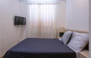 Łóżko lub łóżka w pokoju w obiekcie Holiday Home Vrsar 38