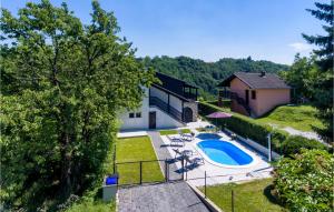 an aerial view of a house with a swimming pool at 2 Bedroom Amazing Home In Vinica Breg in Vinica