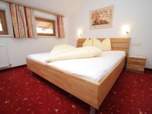 Posteľ alebo postele v izbe v ubytovaní Charming Apartment in Uderns with Balcony + 20 fotografií