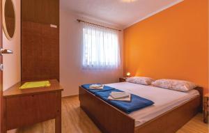 Postel nebo postele na pokoji v ubytování Nice Apartment In Makarska