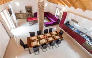 an overhead view of a dining room and living room at Gorgeous Home In Gostinjac With Kitchen in Gostinjac