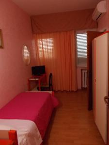 Postel nebo postele na pokoji v ubytování Hotel Maremonti
