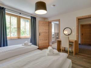 Posteľ alebo postele v izbe v ubytovaní Chalet in Hollersbach near Ski Lift