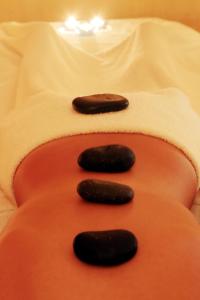 three cookies sitting on the back of a chair at Sesimbra Oceanfront Hotel - Preferred Hotels and Resorts in Sesimbra