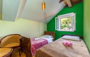 Posteľ alebo postele v izbe v ubytovaní Holiday Home Podstrana 5
