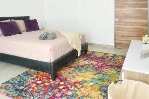 Lovely Icono Playa by Stella Rentals客房内的一张或多张床位