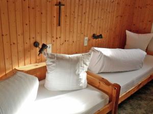 Un pat sau paturi într-o cameră la Chalet in Sibratsgfäll near Ski Slopes